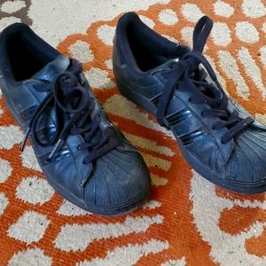 Black Adidas sneakers